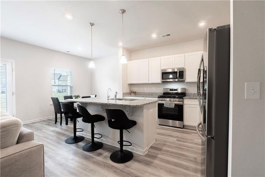 Furnished interior view inside a new home in Ellison Square, Sugar Hill (Image 3).