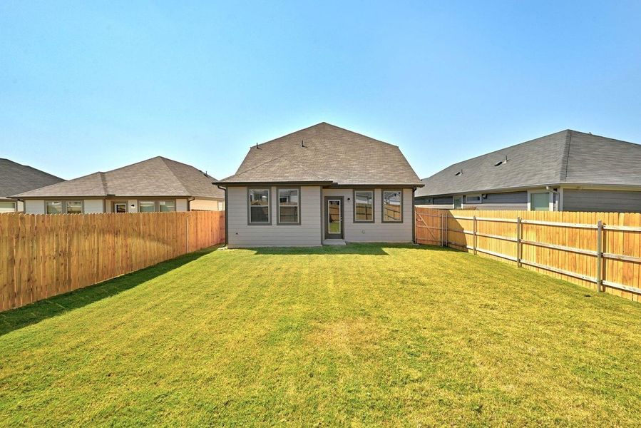 Exterior details and patio area of a home in Trinity Ranch, Elgin (Image 2). Exterior details and patio area of a home in Trinity Ranch, Elgin (Image 2).