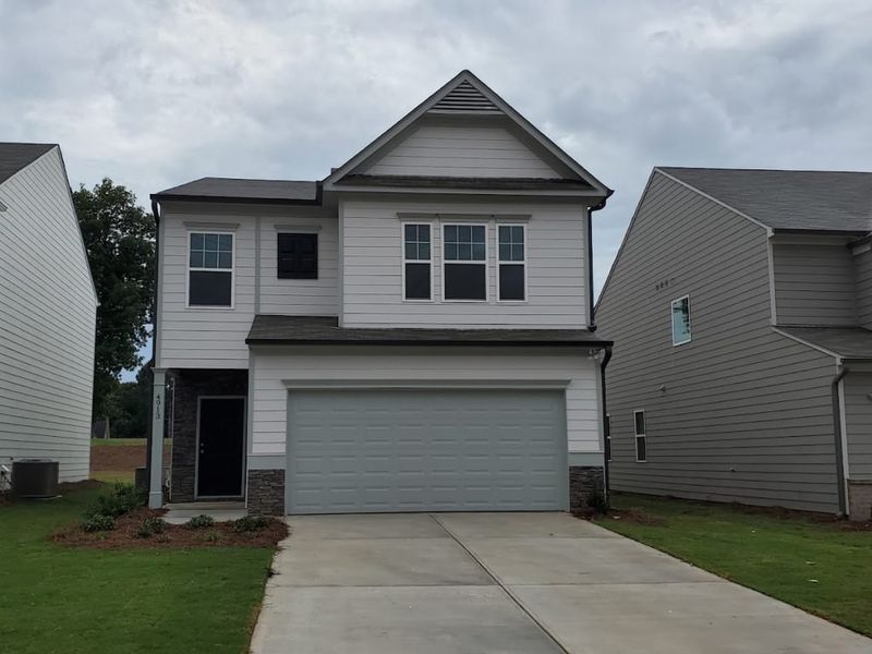Representative exterior photo of a completed home built from the Springdale by Piedmont Residential in Meadowyn, Cartersville, GA (Image 12). Representative exterior photo of a completed home built from the Springdale by Piedmont Residential in Meadowyn, Cartersville, GA (Image 12).