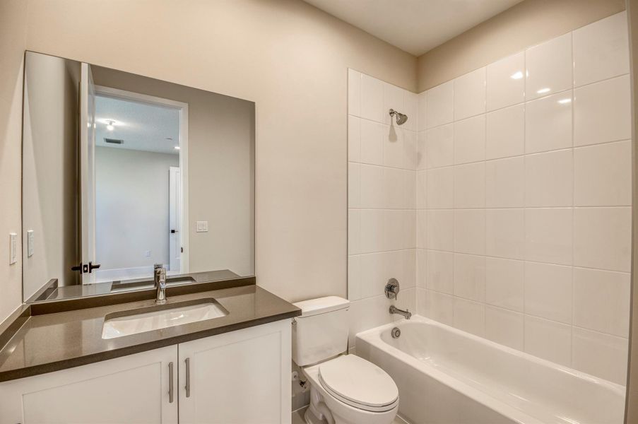 Furnished interior view inside a new home in Apex at Avenir, Palm Beach Gardens (Image 40).