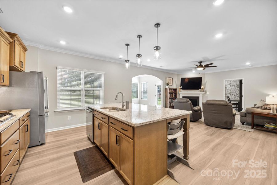 Open floorplan highlights the family room and sunroom. Open floorplan highlights the family room and sunroom.