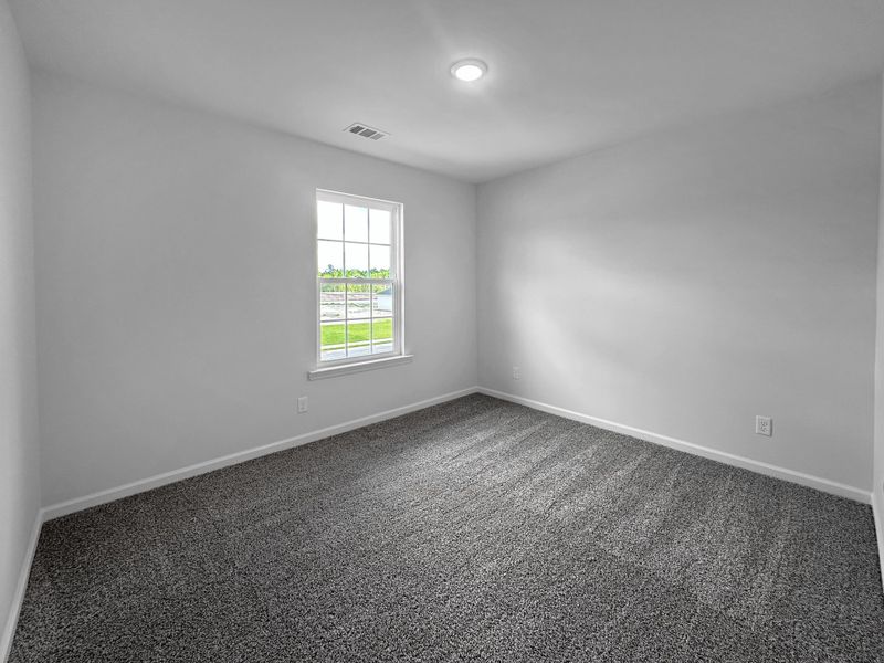 Spacious, unfurnished interior of a new home in Doctor's Creek, Ludowici (Image 17).