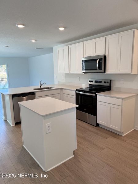 Furnished interior view inside a new home in Trout River, Jacksonville (Image 10).
