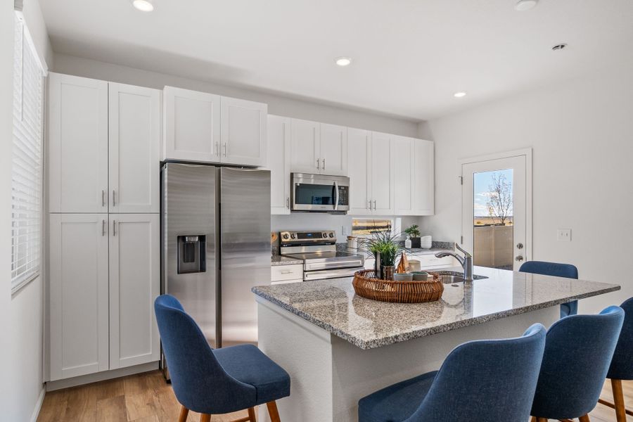 Furnished interior view inside a new home in Green Valley Ranch, Aurora (Image 4).