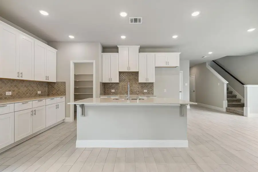 Furnished interior view inside a new home in Venetian, Weston (Image 5).