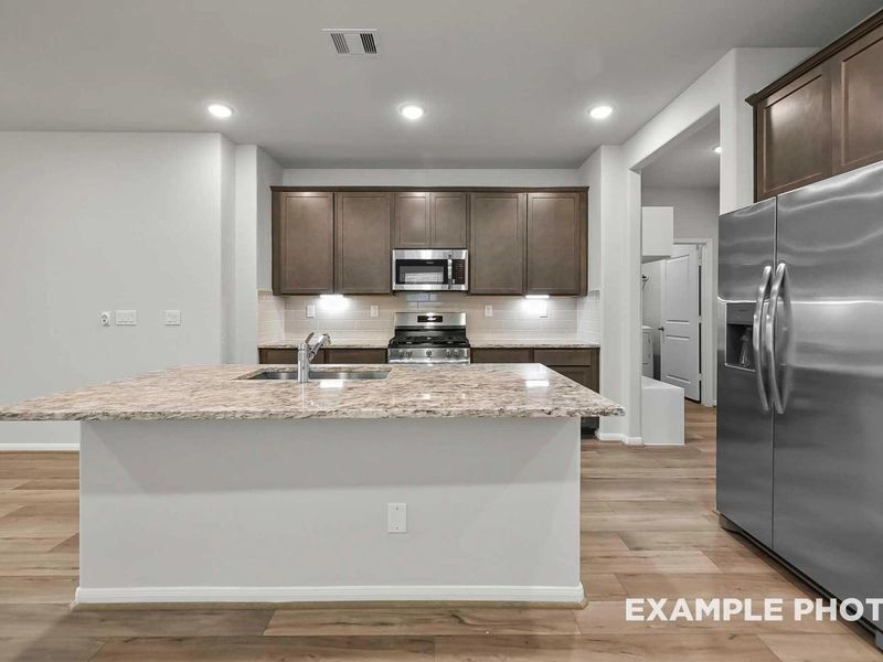 Furnished interior view inside a new home in Caney Creek Place, Conroe (Image 5).