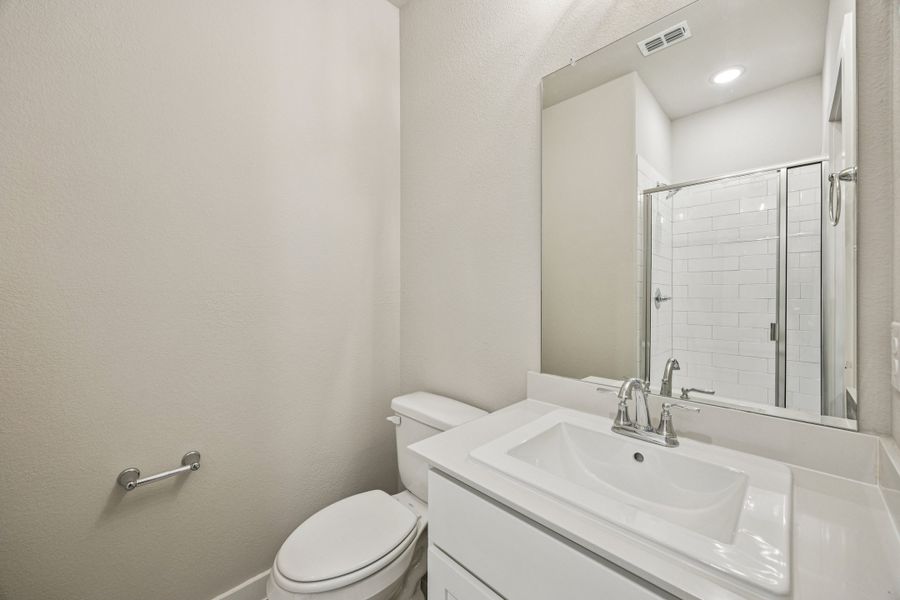 Bathroom in the Oscar home plan by Trophy Signature Homes – REPRESENTATIVE PHOTO Bathroom in the Oscar home plan by Trophy Signature Homes – REPRESENTATIVE PHOTO