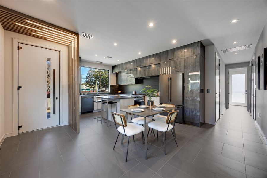View of dining area and kitchen from living room