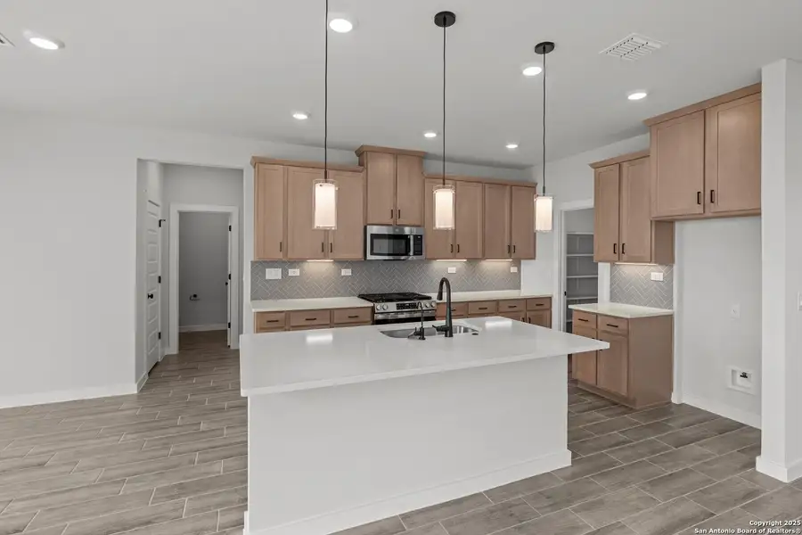 Furnished interior view inside a new home in Weltner Farms 50’s, New Braunfels (Image 5).
