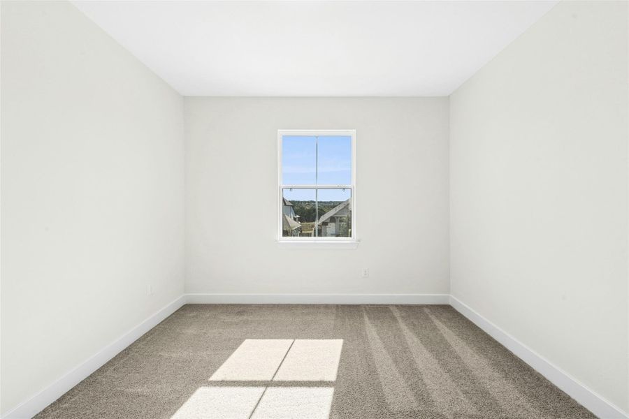 Empty room with light carpet