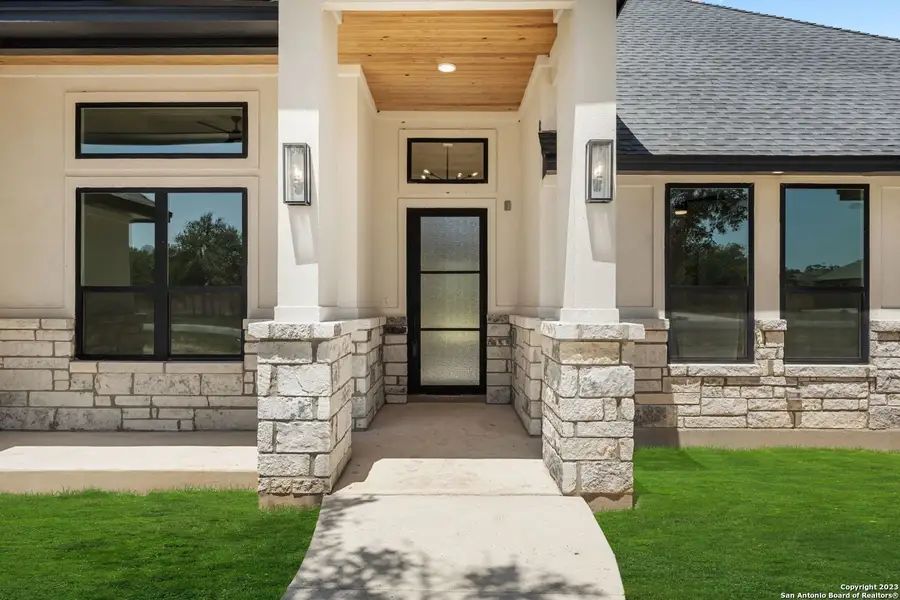 Exterior details and patio area of a home in , Castroville (Image 6).