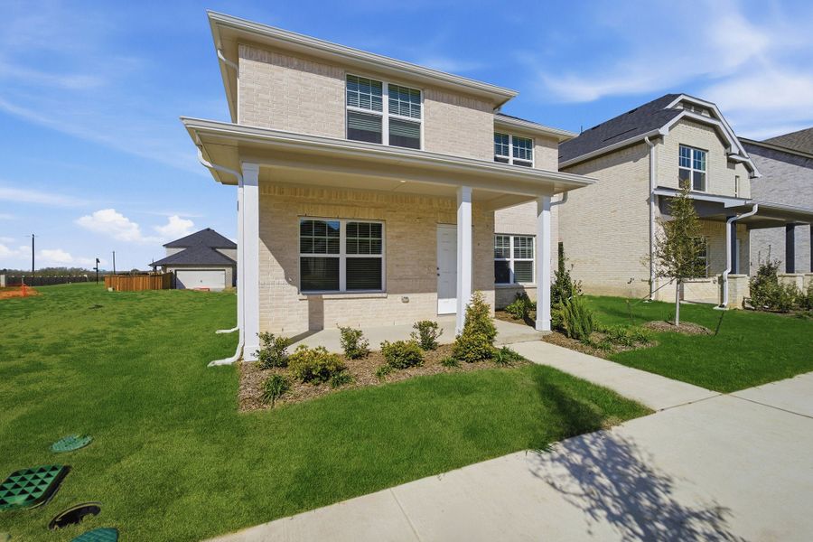 Exterior details and patio area of a home in La Terra, Celina (Image 26).