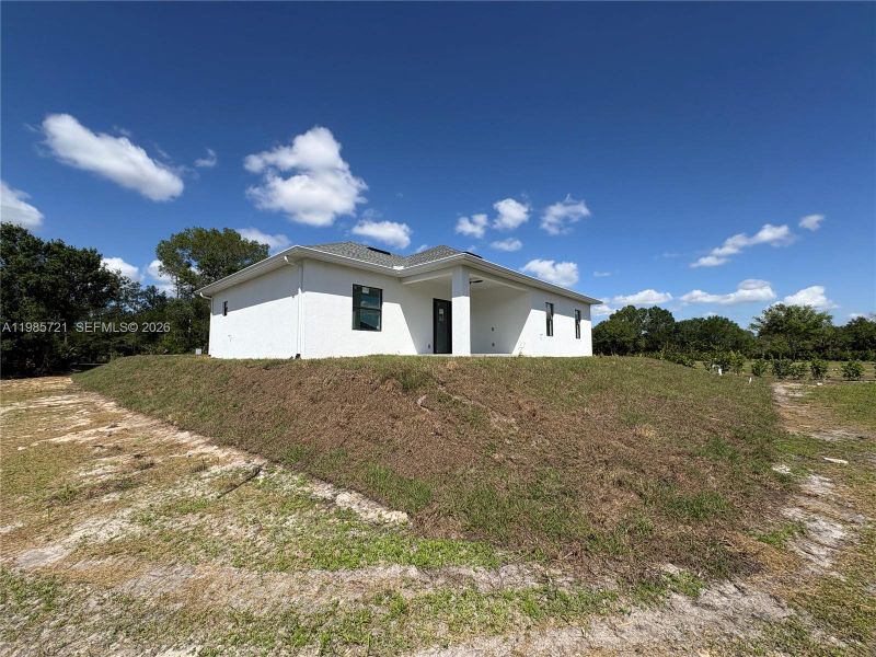 Exterior details and patio area of a home in , Naples (Image 3). Exterior details and patio area of a home in , Naples (Image 3).