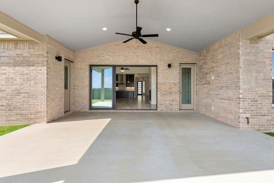 Exterior details and patio area of a home in Santa Rita Ranch, Liberty Hill (Image 25).