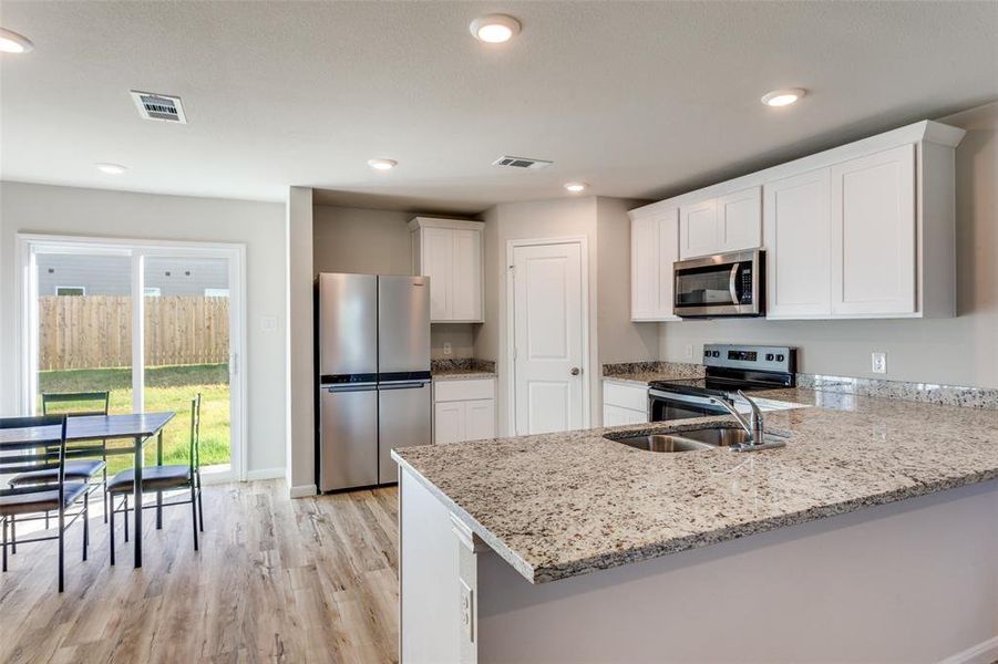 Furnished interior view inside a new home in Courtland Place, Cleburne (Image 11).