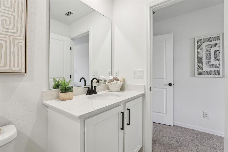 Furnished interior view inside a new home in Hawks Run, Kissimmee (Image 50).