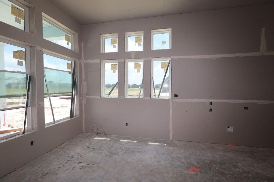 In-progress construction of a new home in Bridgeland Central: Emerald Heights - Enclave Row Collection, Cypress, TX (Image 9).