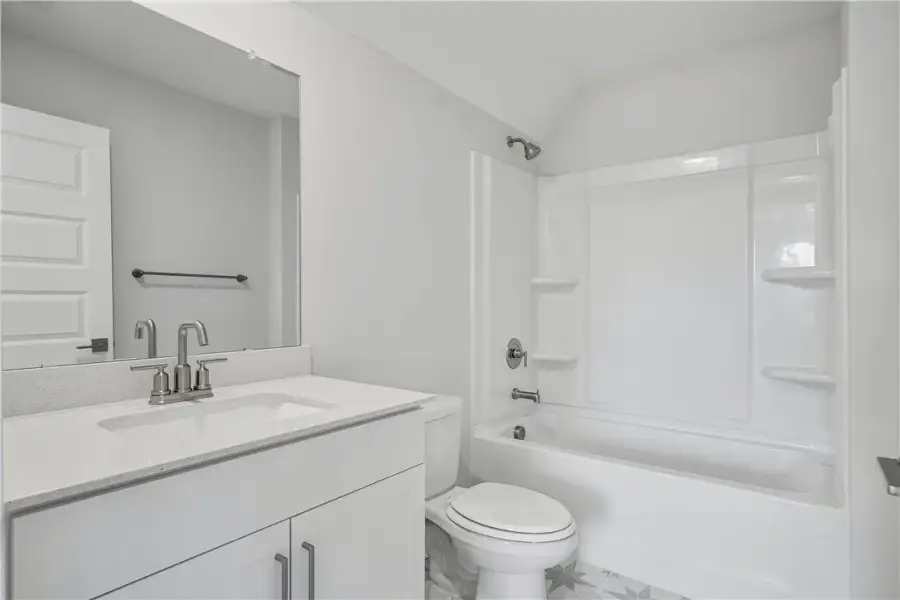 A well-appointed bathroom features a modern vanity A well-appointed bathroom features a modern vanity