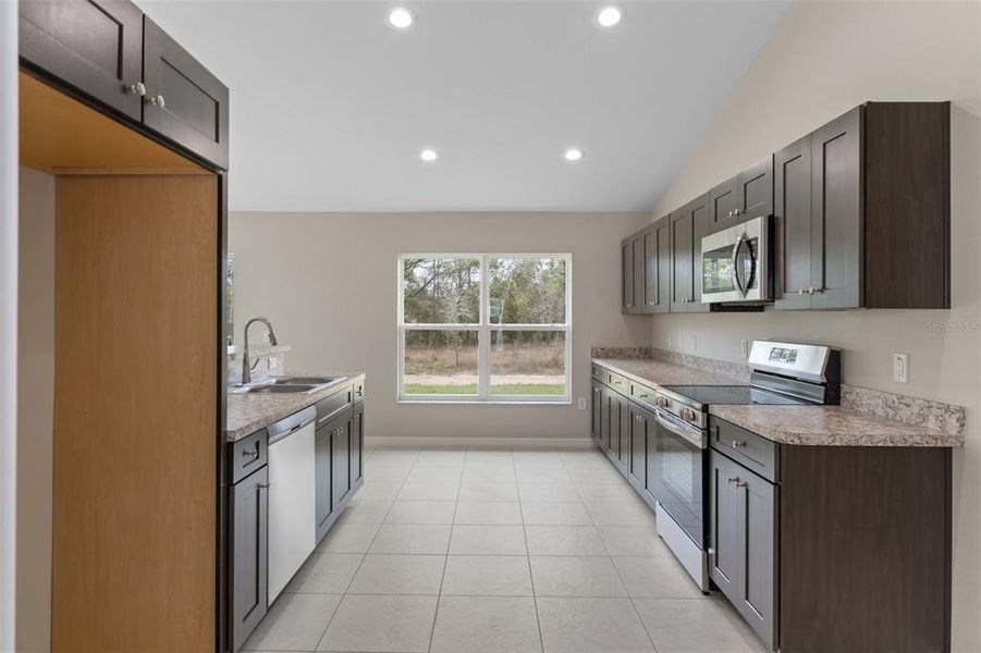 Furnished interior view inside a new home in , Weeki Wachee (Image 9).
