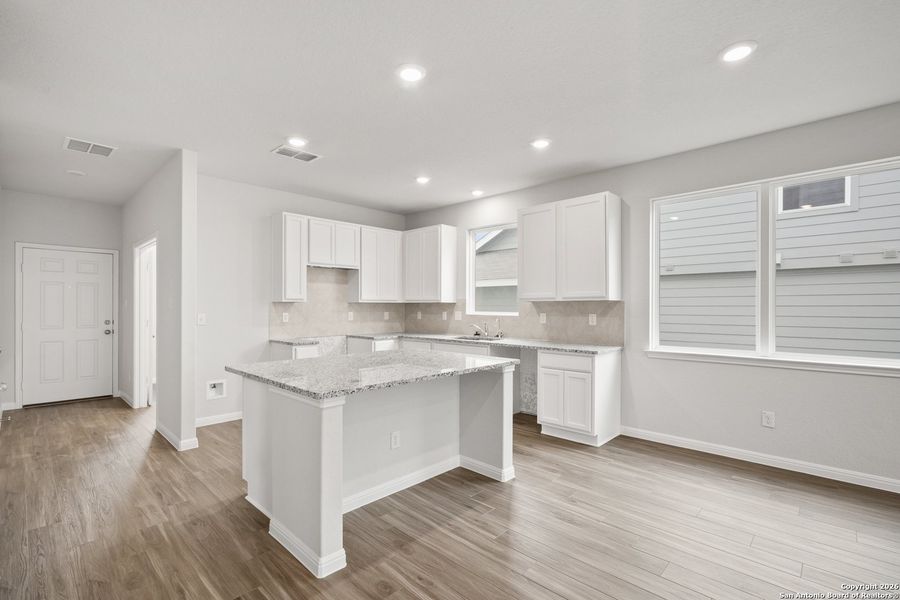 Furnished interior view inside a new home in Cinco Lakes, San Antonio (Image 7).