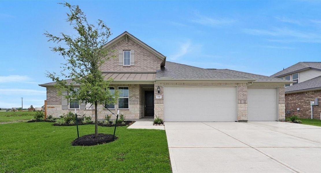 Front exterior of a new home in Lago Mar, Texas City, TX, highlighting curb appeal (Image 1).