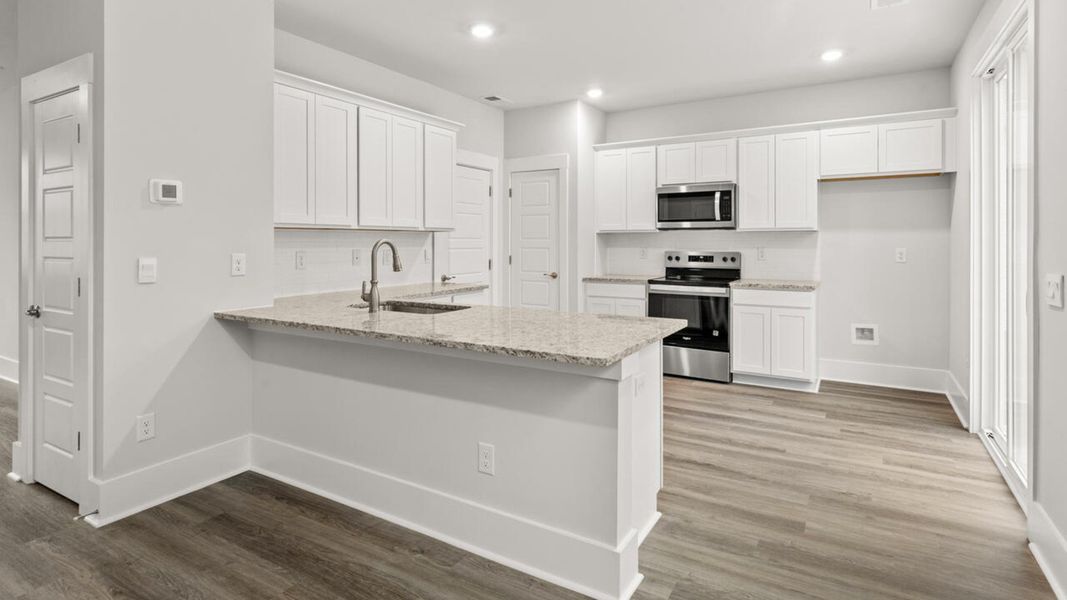 Furnished interior view inside a new home in Lockwood Landing, Supply (Image 6).