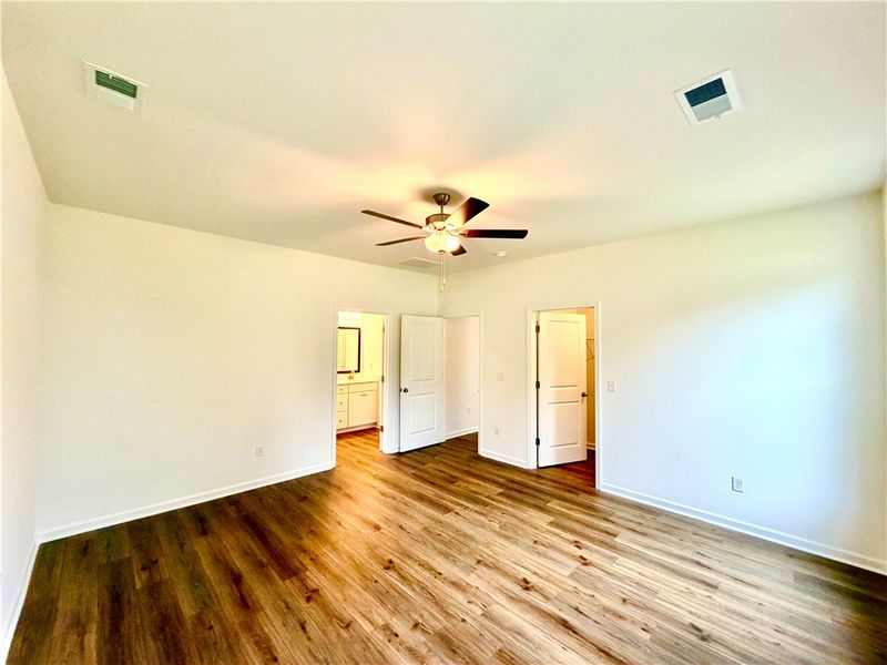 Gleaming hardwood floors and crisp white walls def