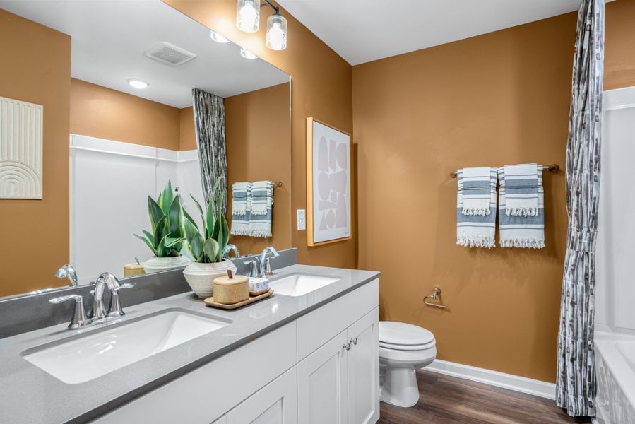 Representative furnished interior of a home built from the Claymore by Mattamy Homes in Magnolia Park Townes, Garner (Image 23).