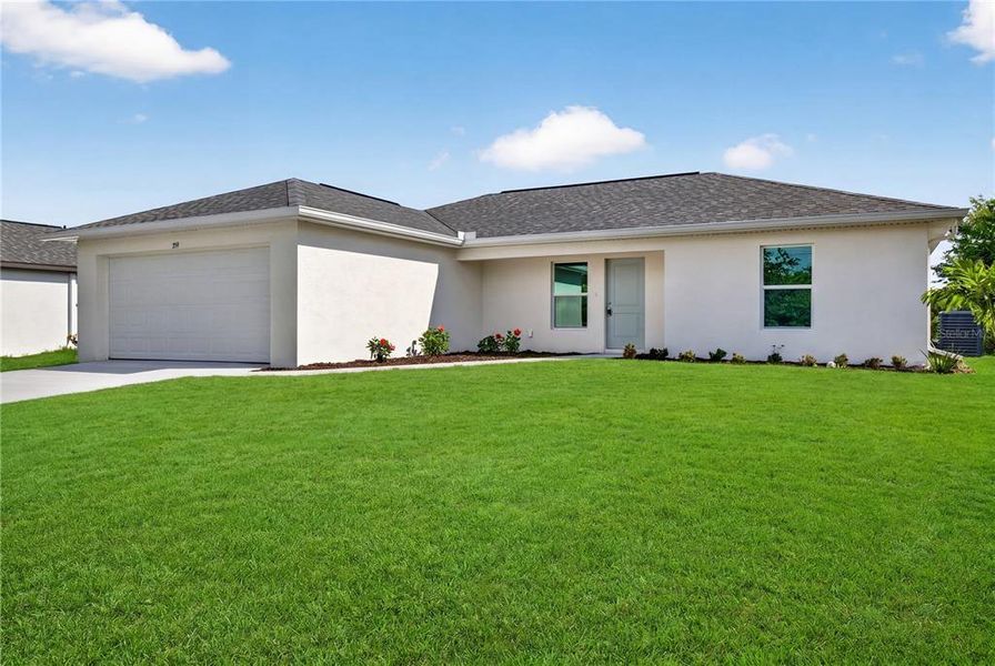 Front exterior of a new home in , Port Charlotte, FL, highlighting curb appeal (Image 2). Front exterior of a new home in , Port Charlotte, FL, highlighting curb appeal (Image 2).