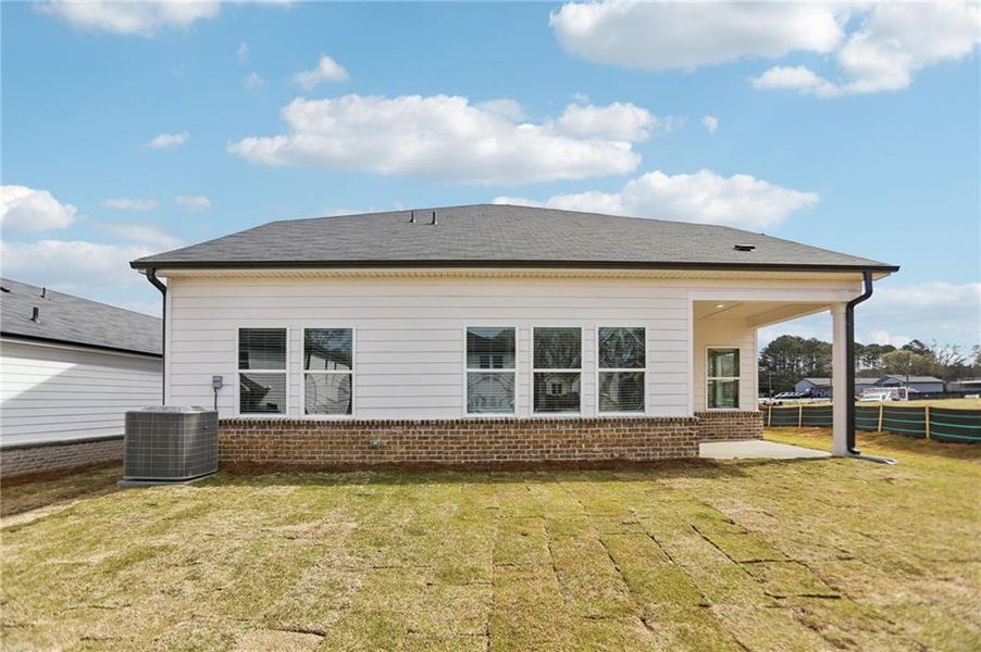 Exterior details and patio area of a home in Westmont Preserve, Powder Springs (Image 24).