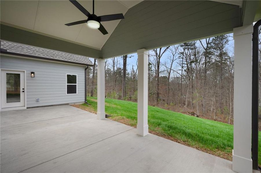 Exterior details and patio area of a home in , White (Image 4).