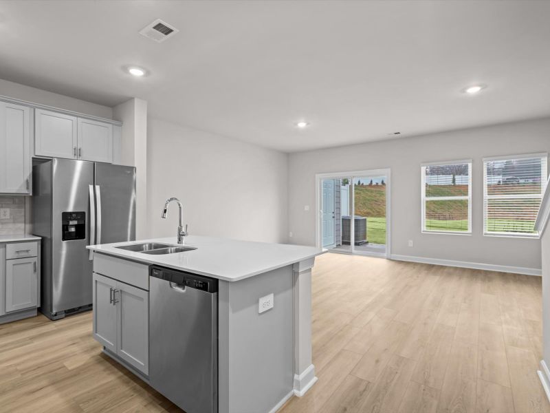 Furnished interior view inside a new home in Crossing at Abner Creek Townes, Greer (Image 3).