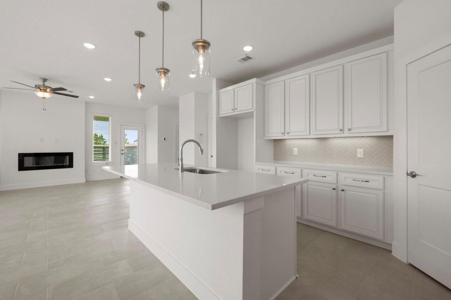 Furnished interior view inside a new home in Bridgeland, Cypress (Image 5).