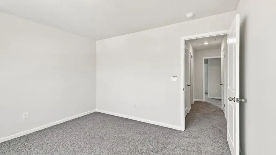 Spacious, unfurnished interior of a new home in Rocky River Ridge, Anderson (Image 30).