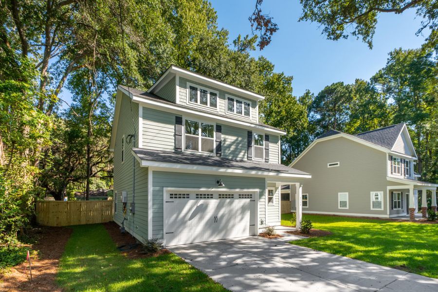 Front exterior of a new home in , James Island, SC, highlighting curb appeal (Image 1). Front exterior of a new home in , James Island, SC, highlighting curb appeal (Image 1).