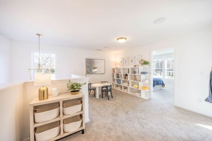 Representative furnished interior of a home built from the Hudson by True Homes in Whispering Hills, Locust (Image 14).