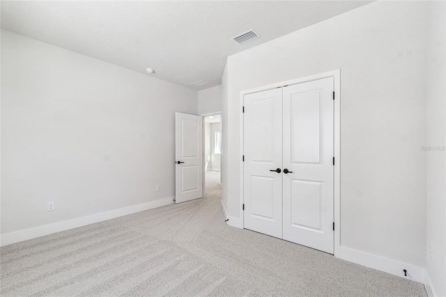 Spacious, unfurnished interior of a new home in Persimmon Park - Garden Series, Wesley Chapel (Image 37).