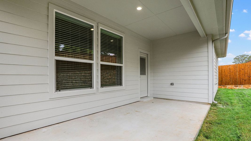 Exterior details and patio area of a home in Eagle Creek, Denton (Image 2).
