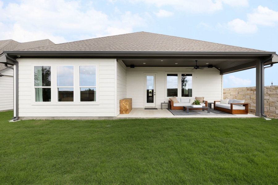 Exterior details and patio area of a home in Turner's Crossing, Buda (Image 28). Exterior details and patio area of a home in Turner's Crossing, Buda (Image 28).