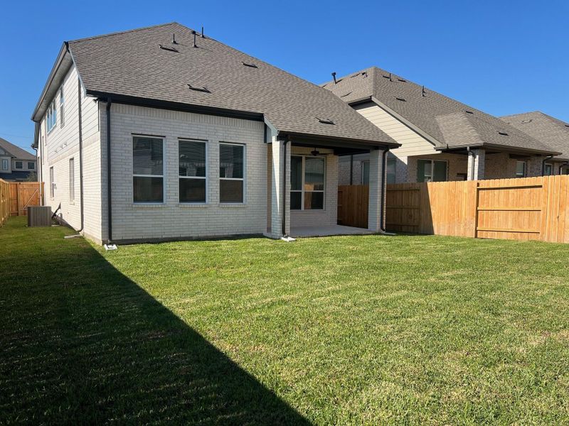 Exterior details and patio area of a home in Wood Leaf Reserve, Tomball (Image 3). Exterior details and patio area of a home in Wood Leaf Reserve, Tomball (Image 3).