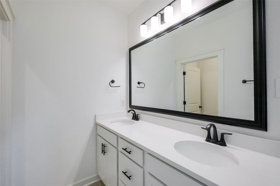 Furnished interior view inside a new home in Aldeana, Bonney (Image 6).