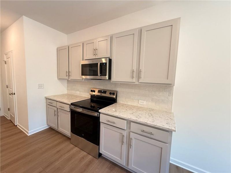 Furnished interior view inside a new home in Leydenview, Mableton (Image 9).