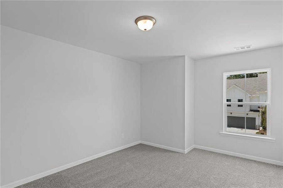 Spacious, unfurnished interior of a new home in Ansley Towns, Cumming (Image 12).