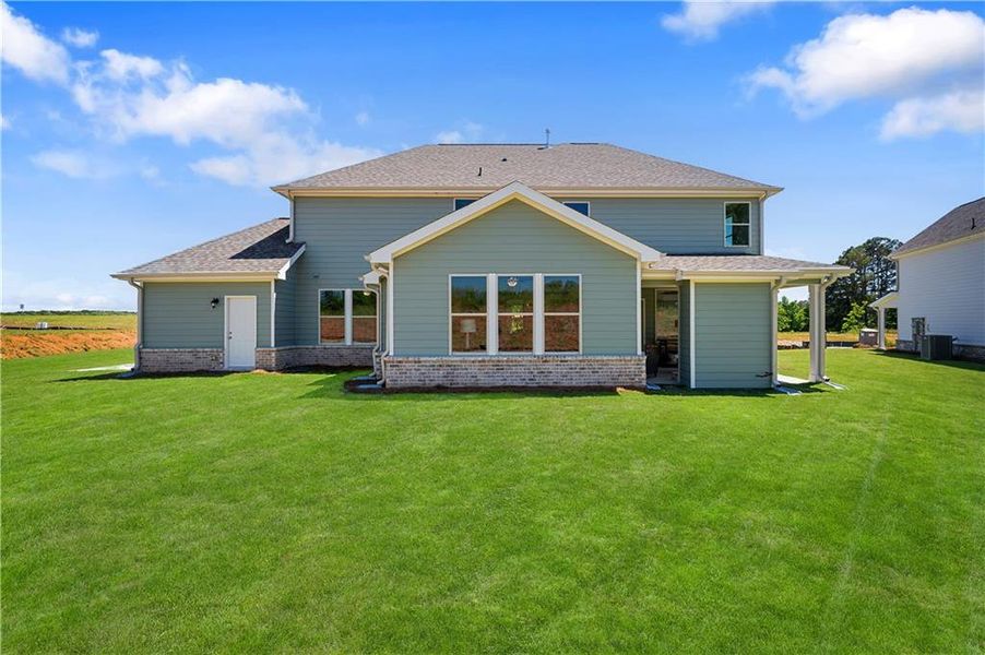 Exterior details and patio area of a home in Brighton, Locust Grove (Image 25).