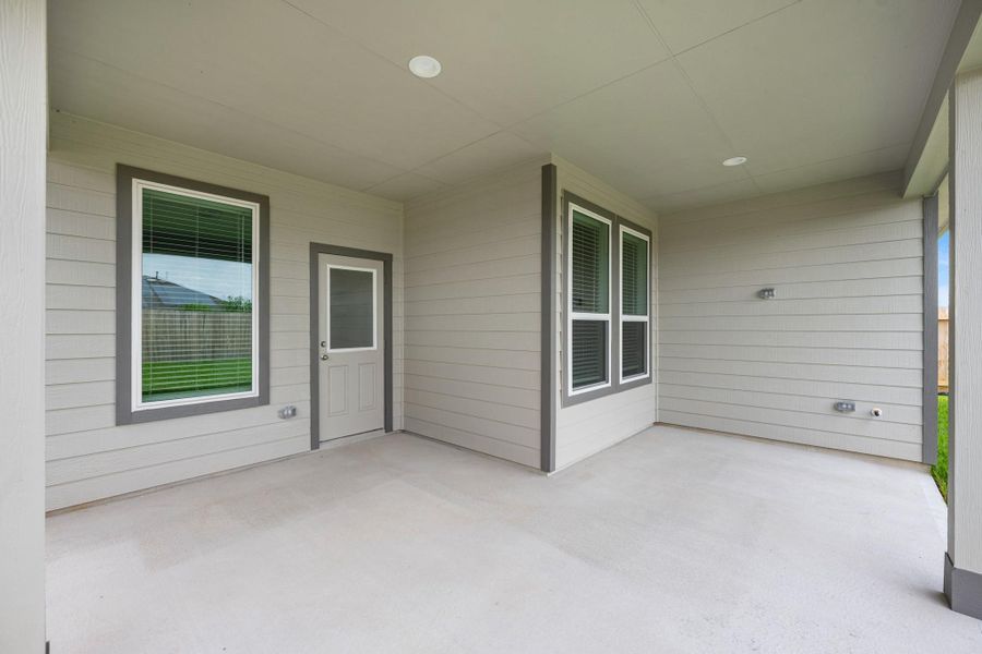 Exterior details and patio area of a home in Grand Mason Crossing, Park Row (Image 3).