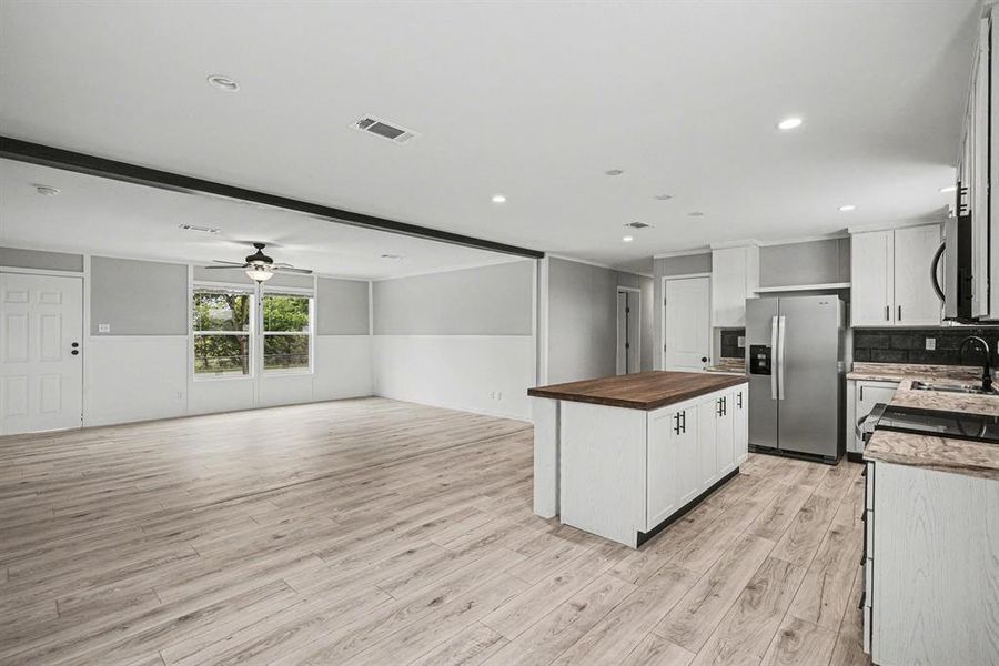 Open-concept kitchen and living area.