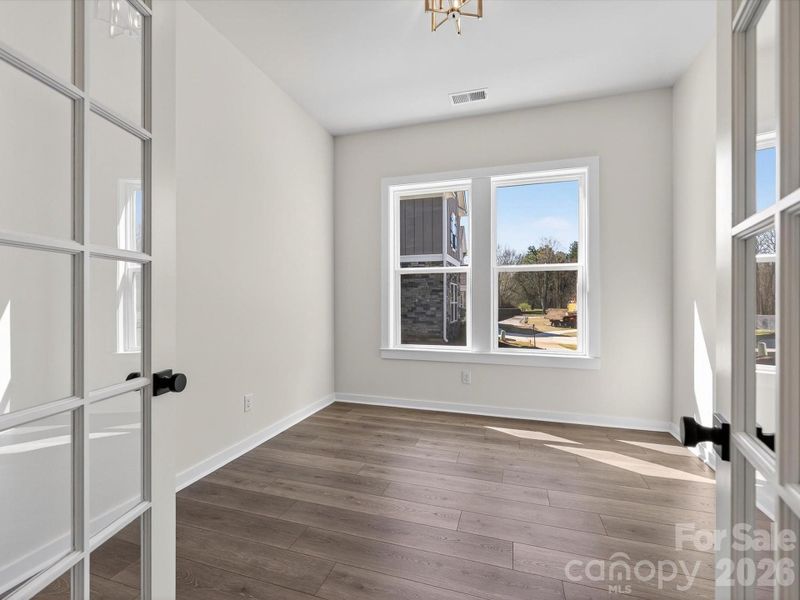 Spacious, unfurnished interior of a new home in North Creek Village, Huntersville (Image 29).