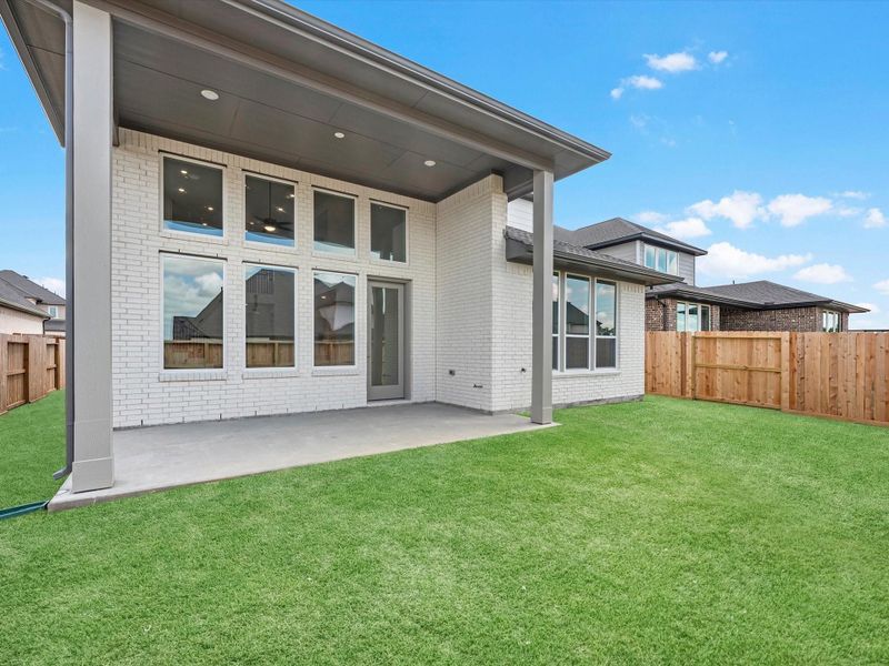 Exterior details and patio area of a home in Pecan Ridge, Fulshear (Image 3). Exterior details and patio area of a home in Pecan Ridge, Fulshear (Image 3).