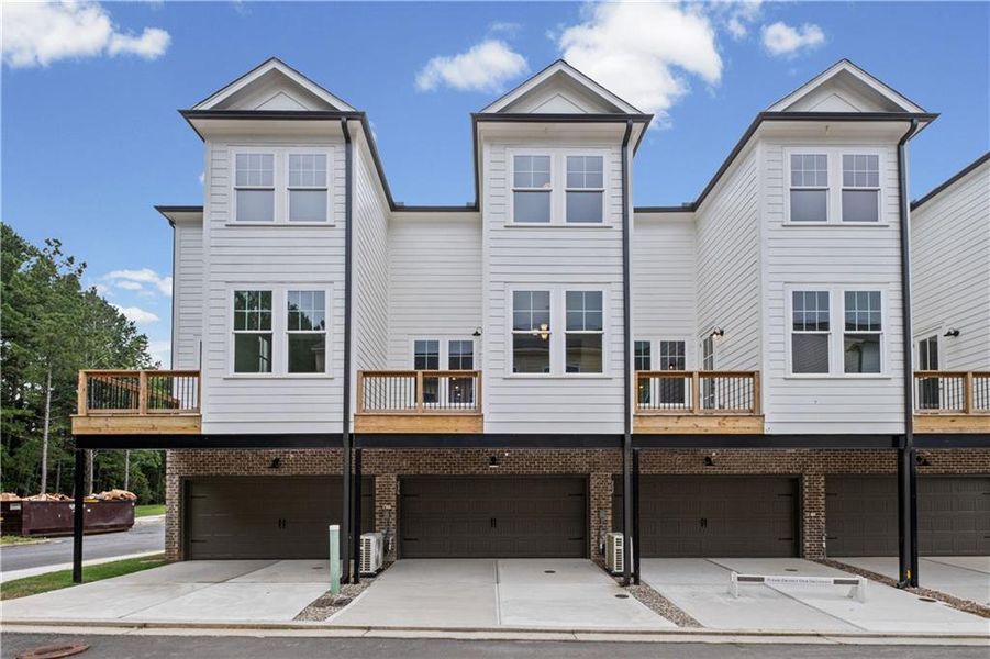 Front exterior of a new home in , Canton, GA, highlighting curb appeal (Image 18).