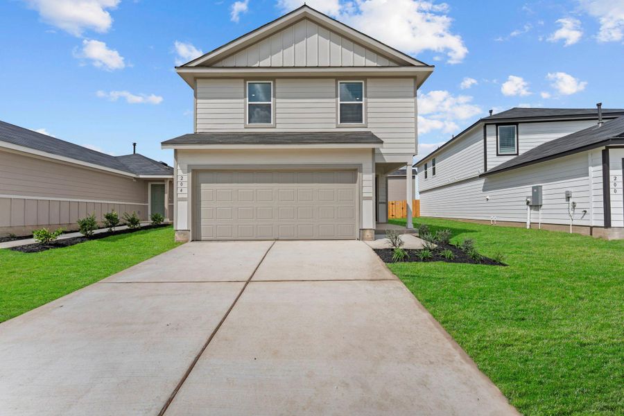 Front exterior of a new home in , Maxwell, TX, highlighting curb appeal (Image 1). Front exterior of a new home in , Maxwell, TX, highlighting curb appeal (Image 1).